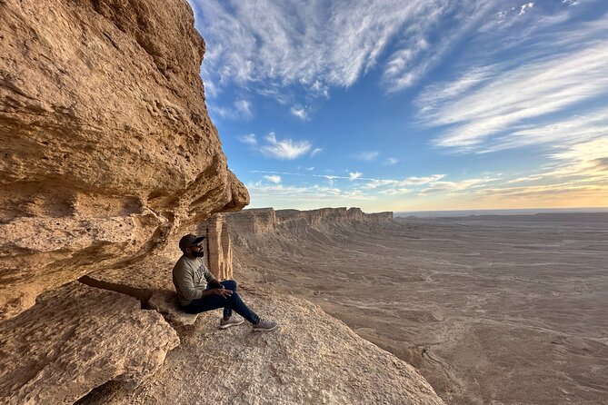 Edge of The World Riyadh with Camel Ride ,Bat Cave Visit & Dinner - Stop 1: camel riding in Riyadh desert, 30 minutes total with a short ride