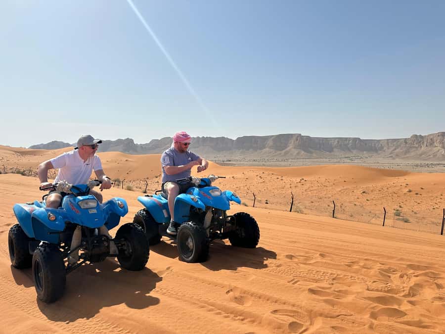 Red Sand: Dunes ATV, + Camel Ride + sandboarding - Meeting Point at Starbucks and Timing for Better Comfort