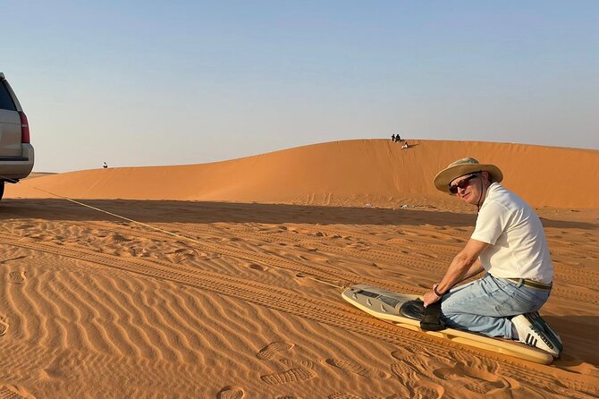 Red Sand Dunes Tour with Camel Ride ,Quad Biking, Heritage House - Your guide matters: Obaid, Abdo, and the art of dune photos
